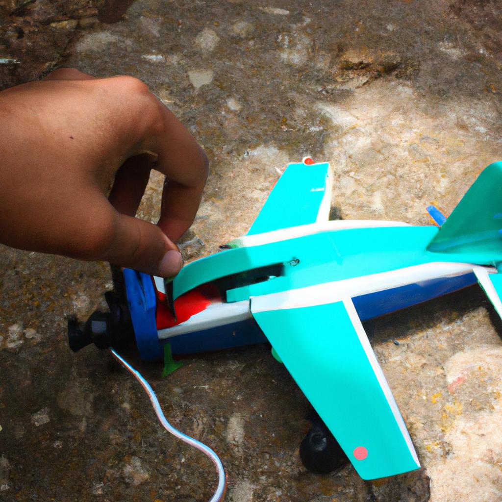 Person using RC plane charger
