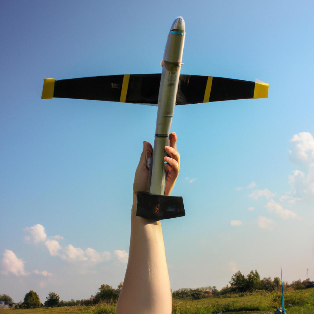Person holding RC plane receiver