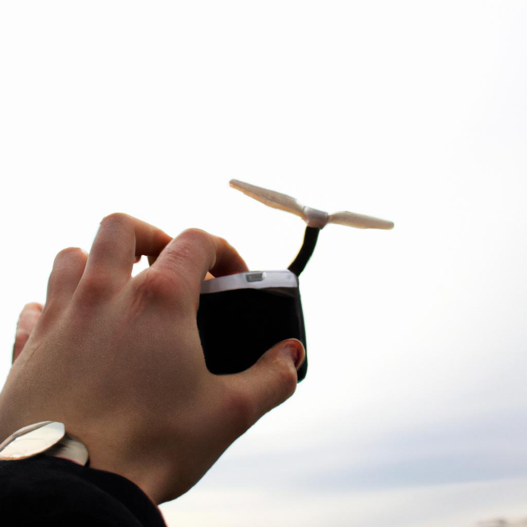 Person holding remote control, flying