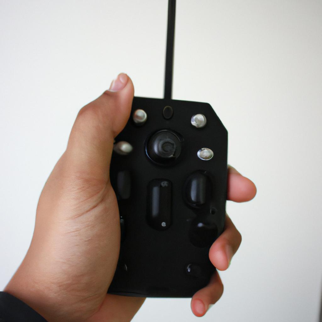 Person holding remote control transmitter